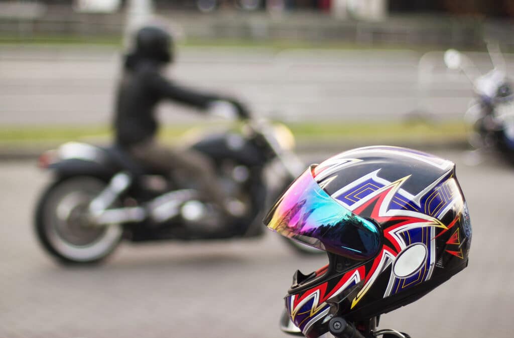 Bright Motorcycle Helmet In Focus And Out Of Focus Motorcycle Wi